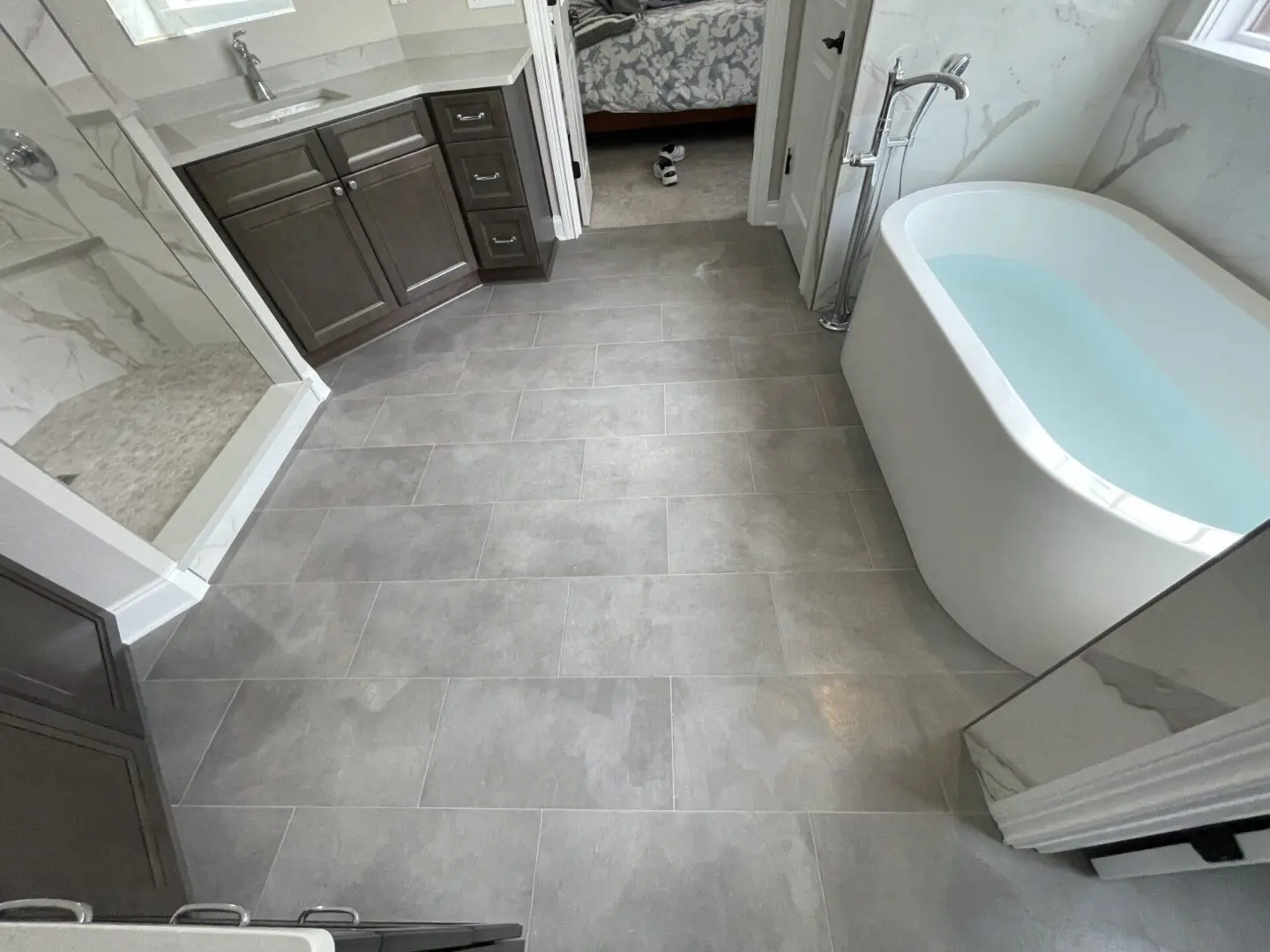 A bathroom with a tub and sink in it