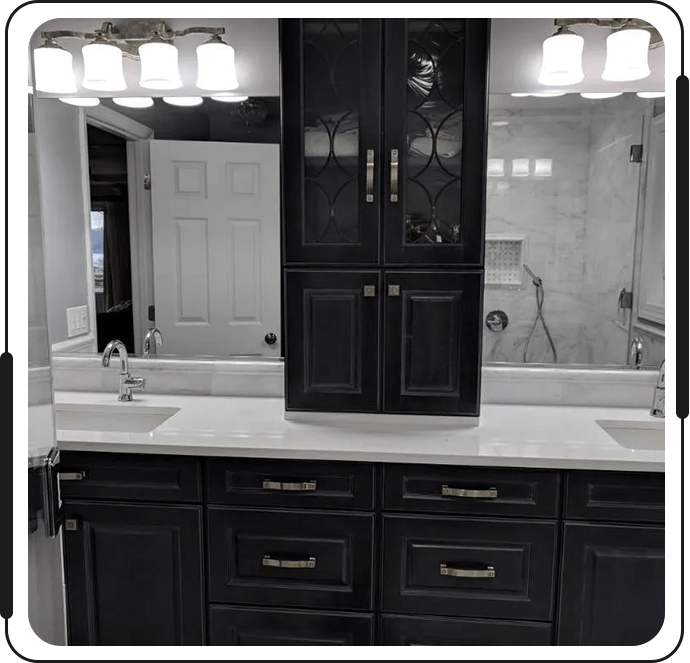 A bathroom with two sinks and a large mirror.